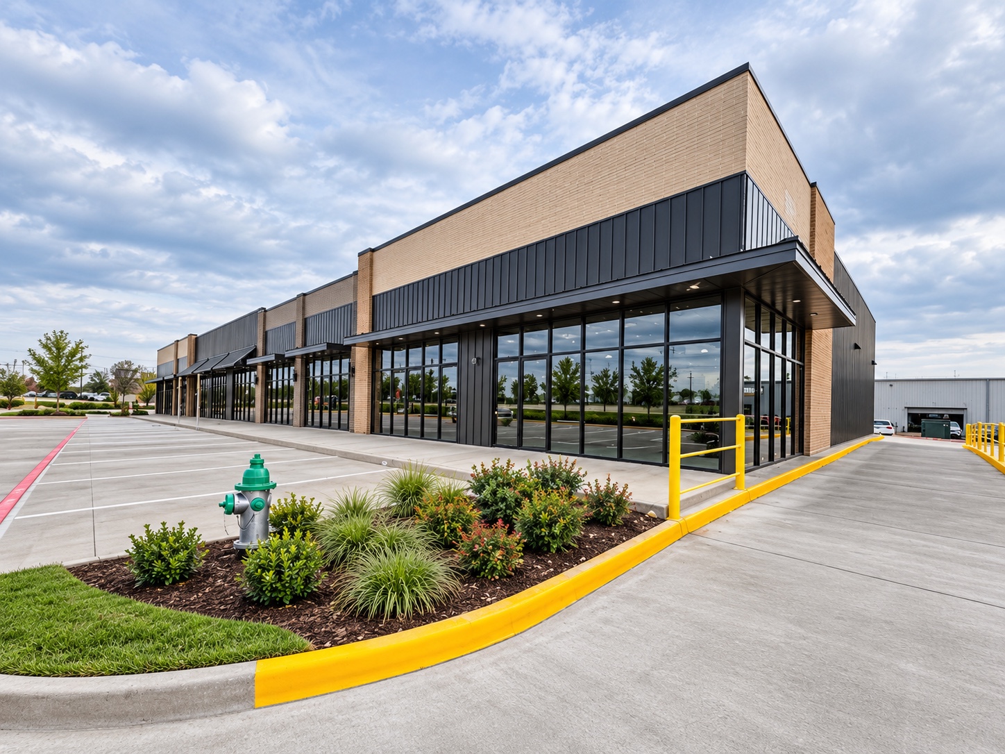 Retail center with continuous black framed commercial storefront