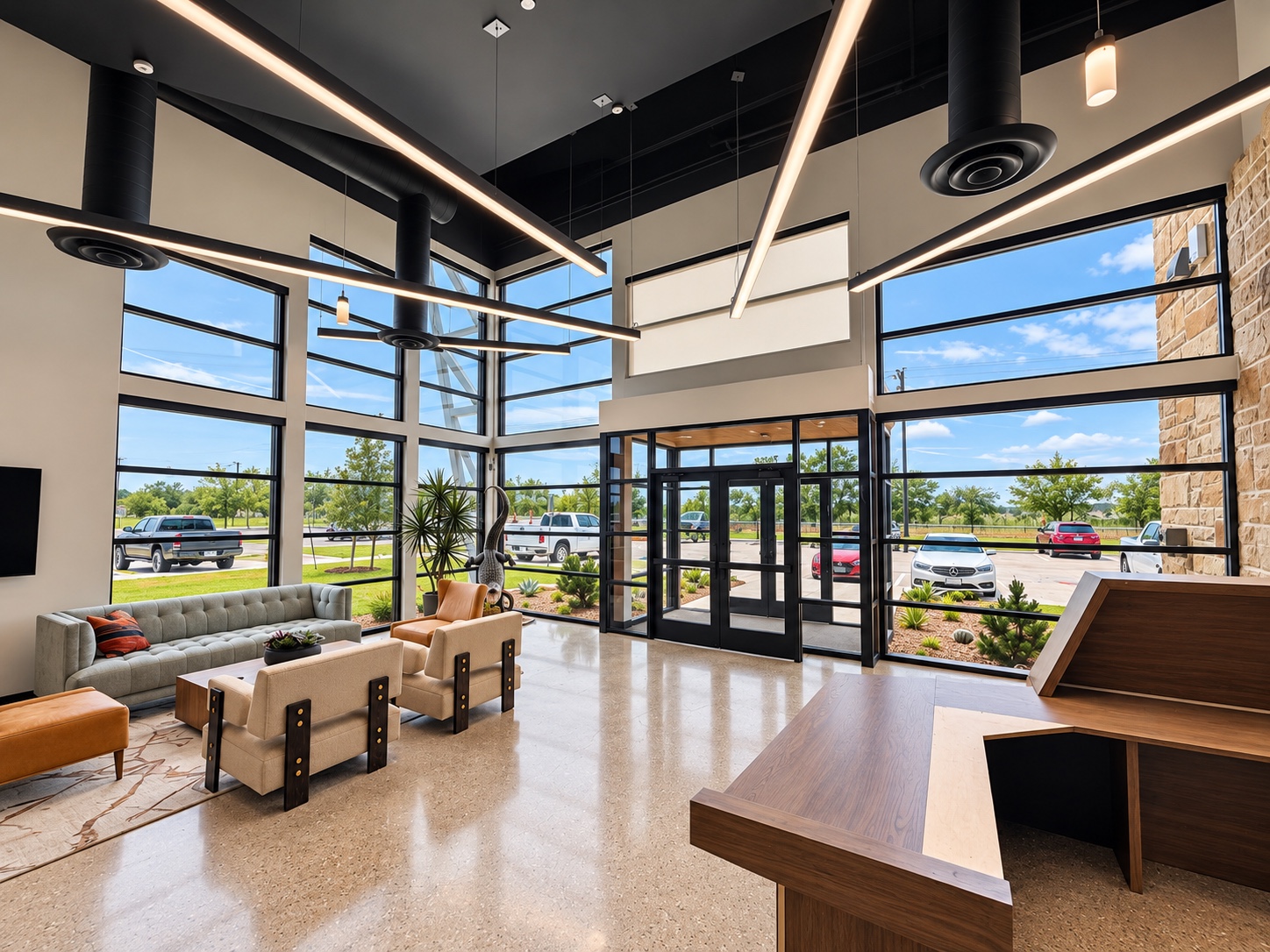 Commercial lobby with expansive exterior glazing and glass entrance doors
