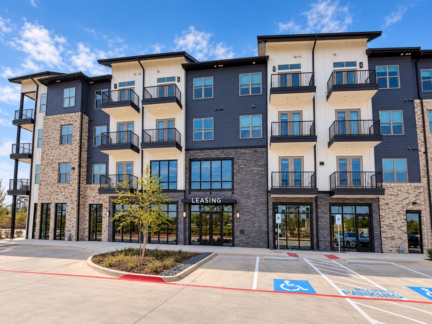 Second view showing the completed storefront and leasing entrance