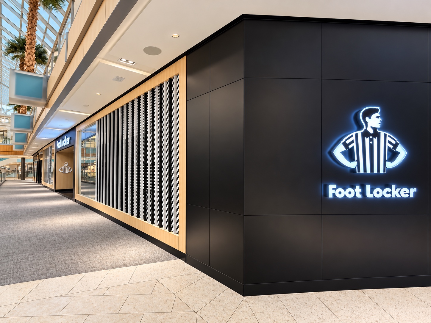 Foot Locker retail frontage with glazing and architectural metal detailing